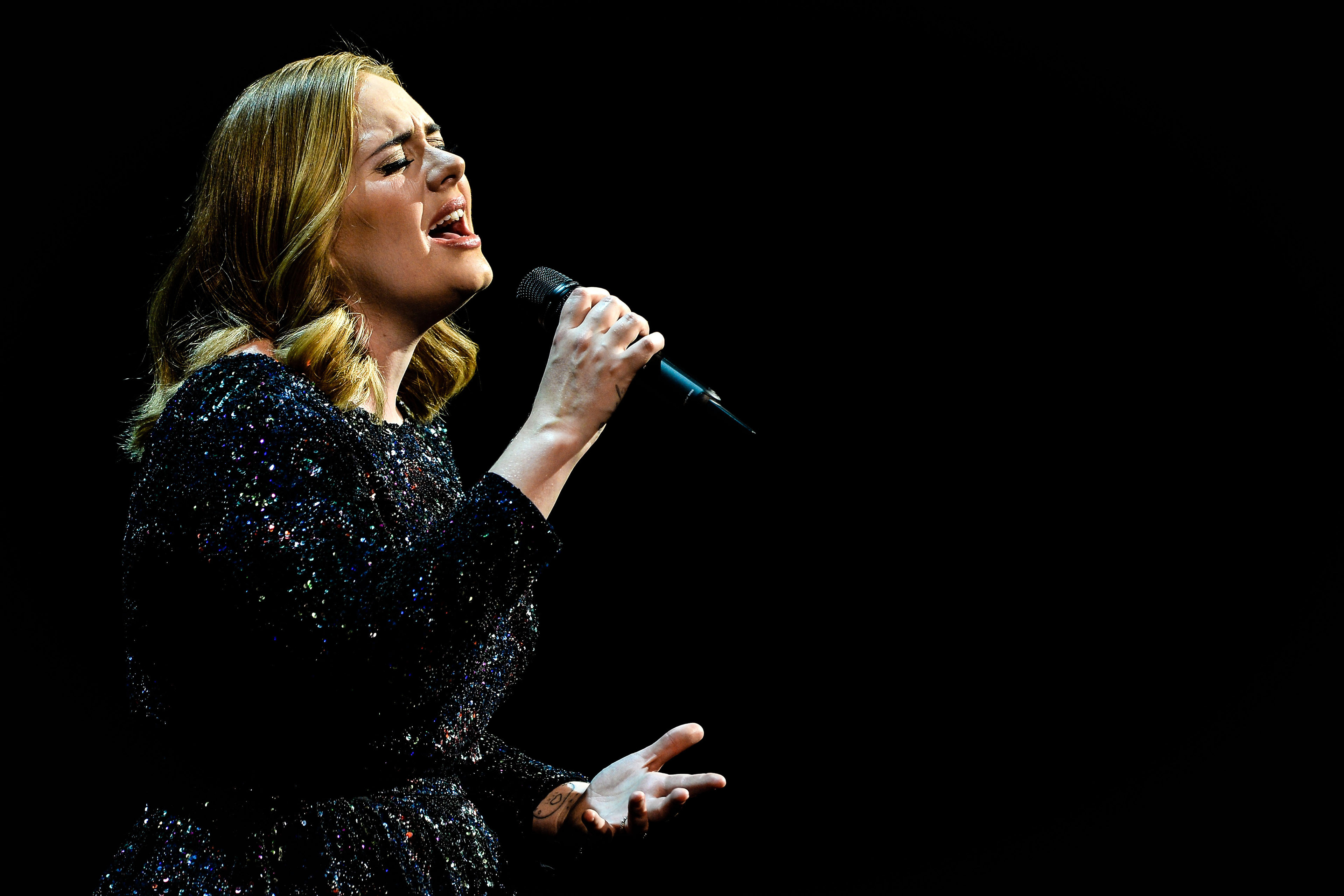 British singer Adele performs at SportPaleis in Antwerpen, Belgium, 12 June 2016. (Photo by Sascha Steinbach/Getty Images For Adele)