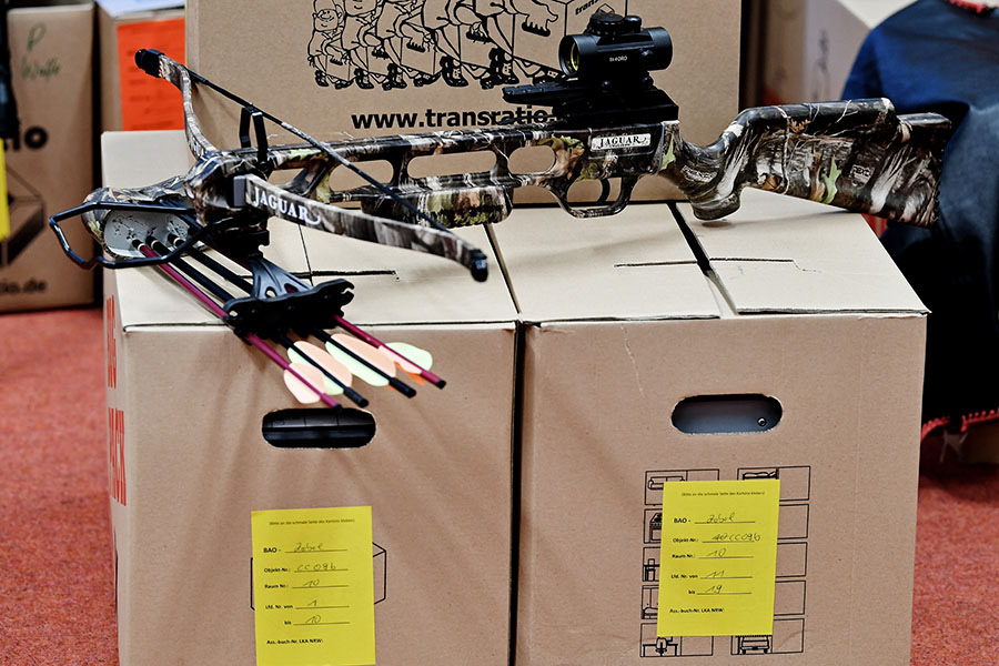 Confiscated weapons, drugs, cash money about 330,000 € and other items are on display at the main customs office in Krefeld, Germany, 30 January 2018. Thousands of special police and customs units were engaged in nationwide raids targeting organised illicit labour. (Photo by Sascha Steinbach/epa)