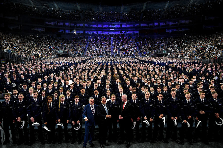 2,300 police officers take their oath of allegiance to the state constitution at Lanxess Arena in Cologne, Germany, 03 April 2019. (Photo by Sascha Steinbach/epa)