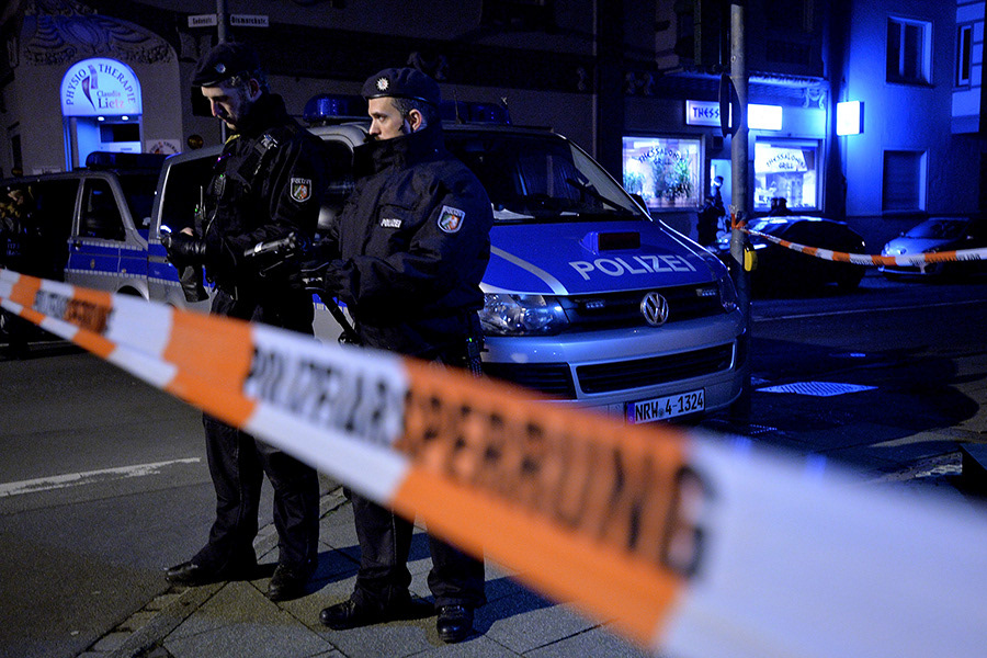 Police Officers in a street after an apartment fire was extinguished in Herne, Germany, 09 March 2017. After a manhunt, German police confirme they arrested 19-year-old Marcel H. who after his arrest pointed police to a fire in an apartment in Herne in which two bodies were found. (Photo by Sascha Steinbach/epa)