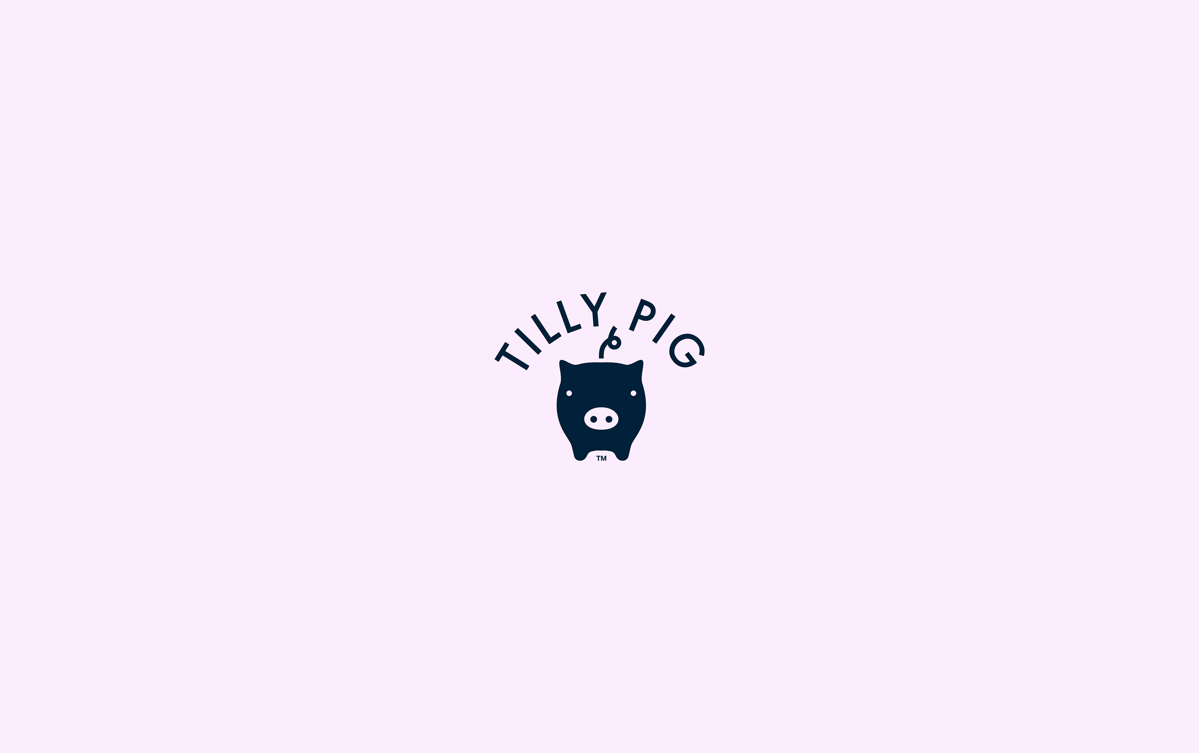 The Tilly Pig logo, with lots of space around it. The logo is a representation of a high end luxury piggy bank and shows the pigs outline as a silhouette from the front view, with the wordmark designed around the top of the icon