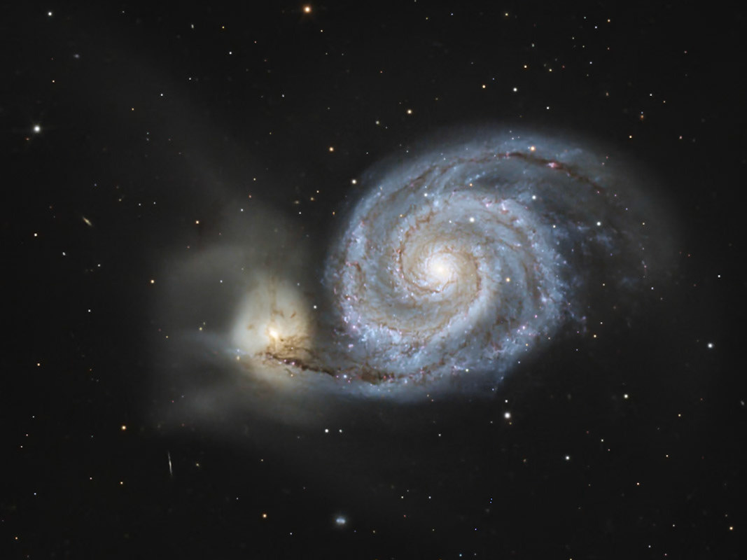 Le Tourbillon M51 absorbe sa petite voisine dans une danse macabre qui dure depuis des millions d'années