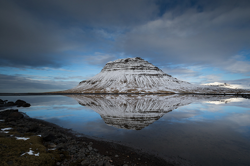 Kirkjufell and its reflection