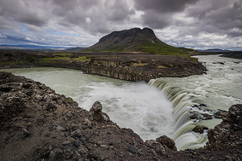 Waterfall Þjófafoss and mountain Búrfell