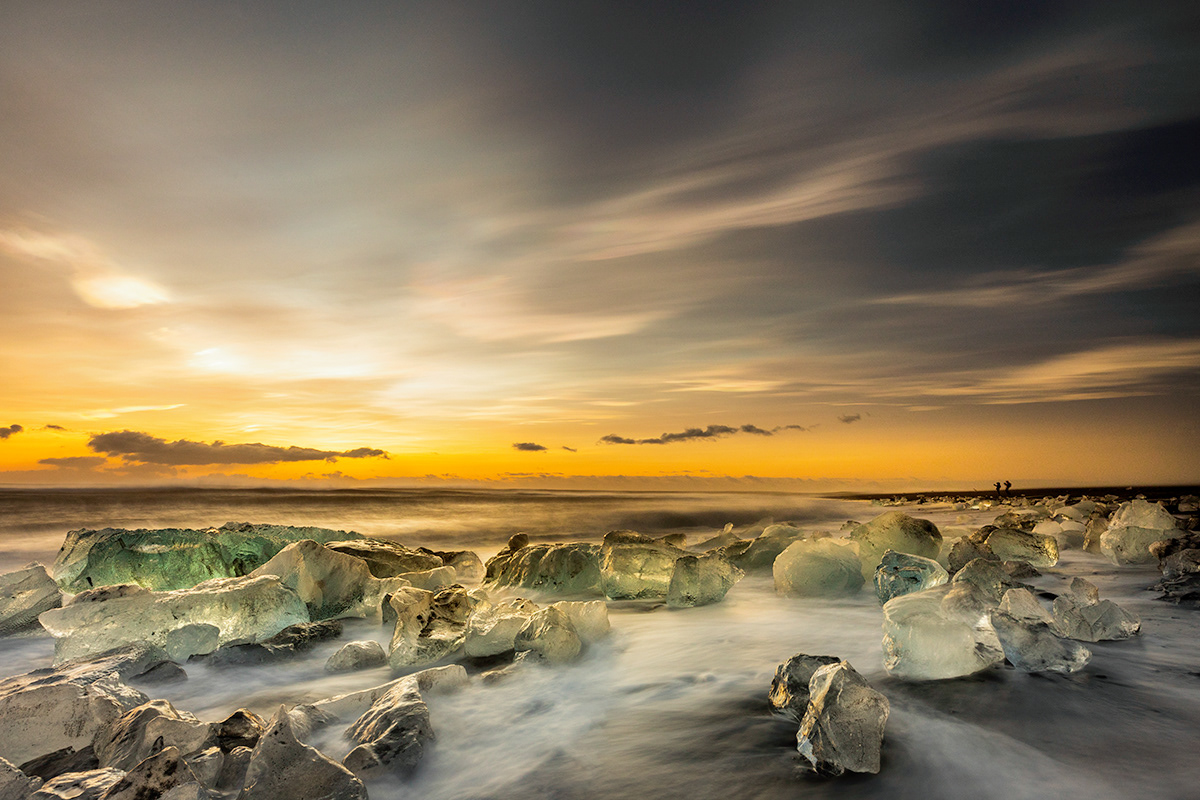 Diamond beach and glittering clouds
