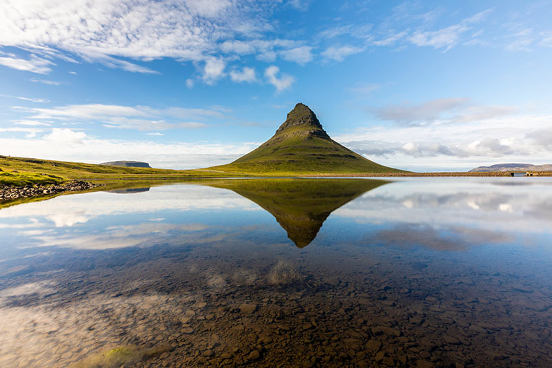 Kirkjufell and its reflection