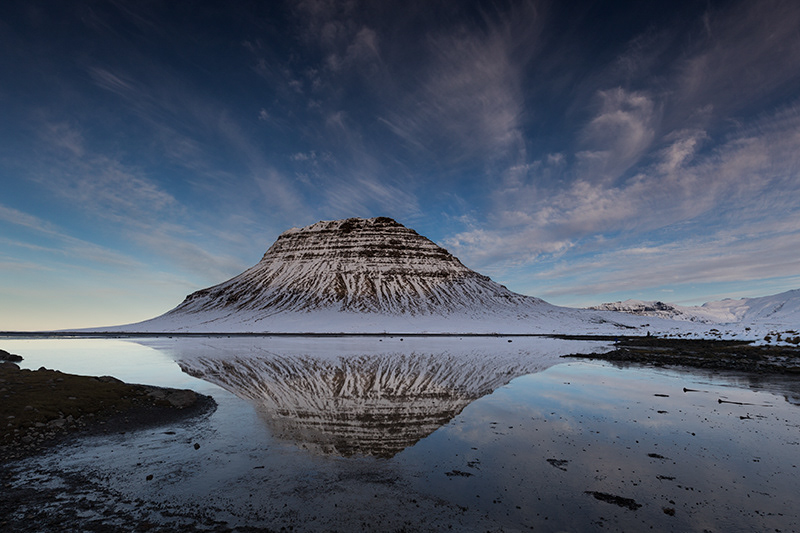 Kirkjufell and its reflection