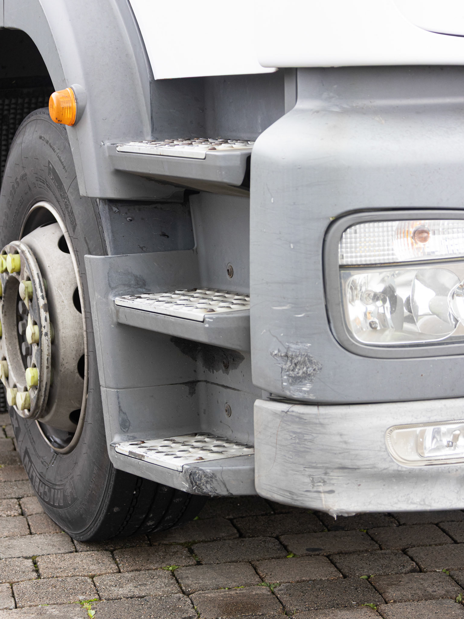 Scraped truck fender (narrow roads)