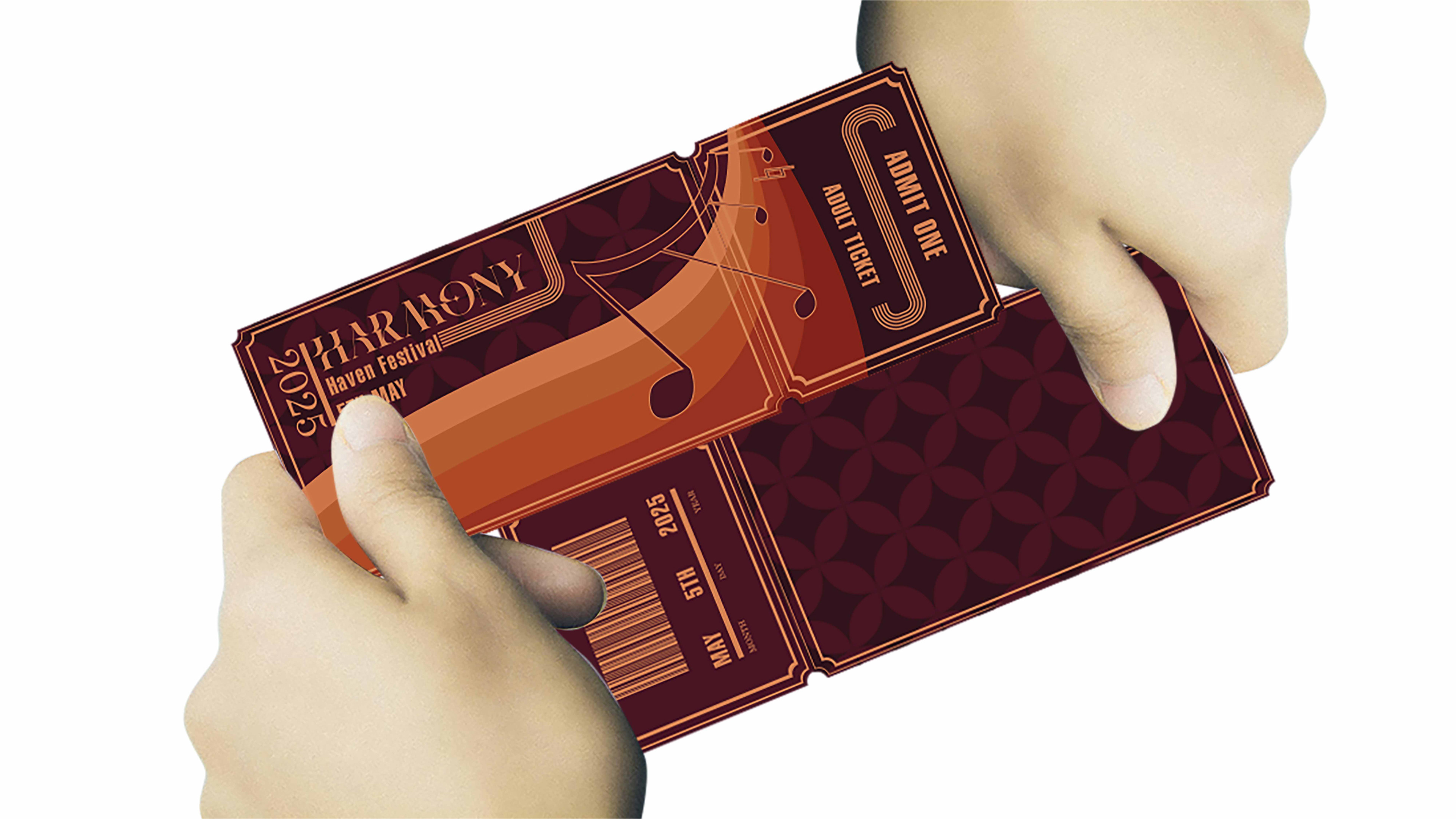 Two hands holding Harmony Festival Tickets