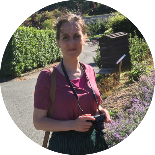 Photo of artist taking photos of nature for inspiration
