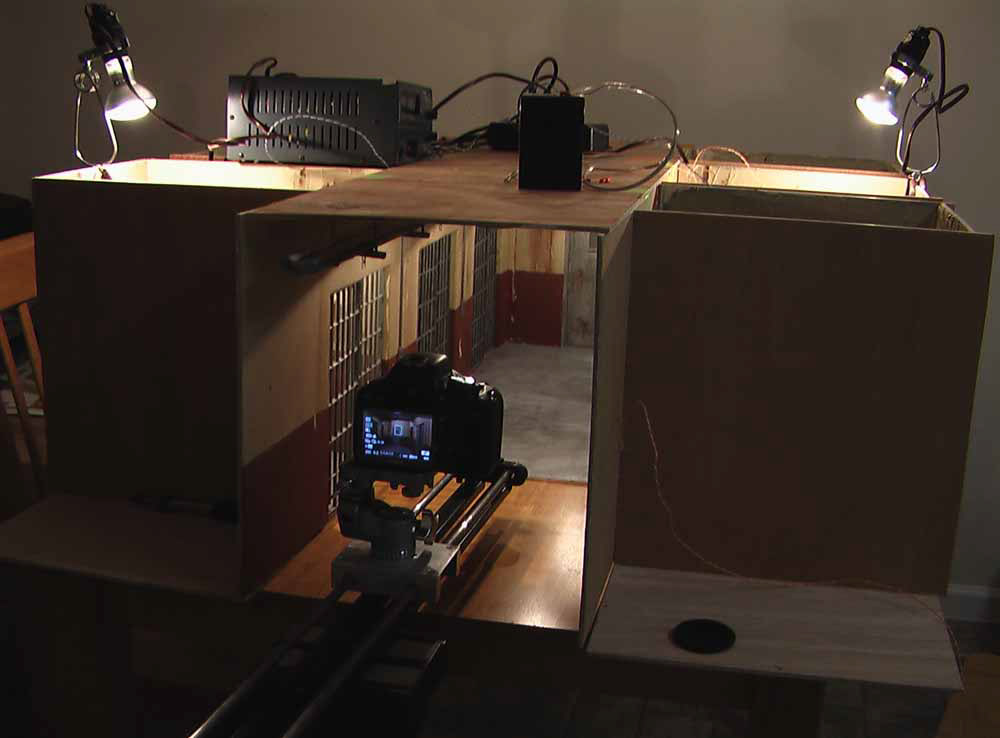 "Orangeman" music video miniature jail hallway filming model.