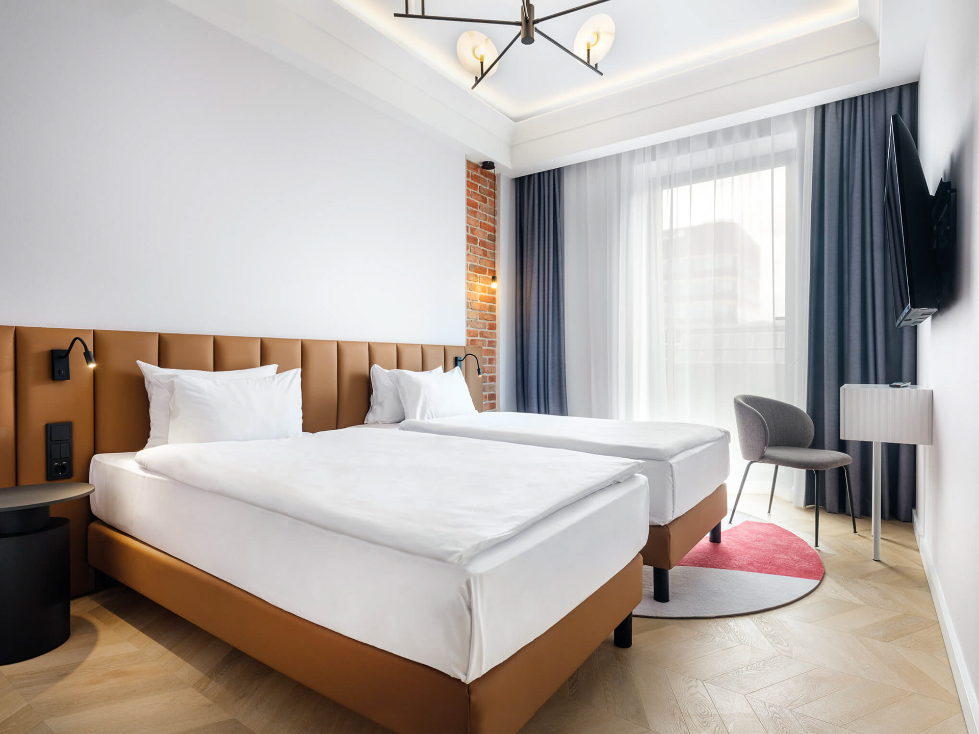 mała sypialnia w apartamencie w hotelu Mercure Fabryczna City w Krakowie