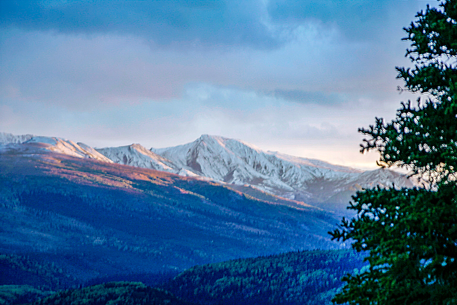 Sun setting on mountainside - Denali National Park, Alaska
