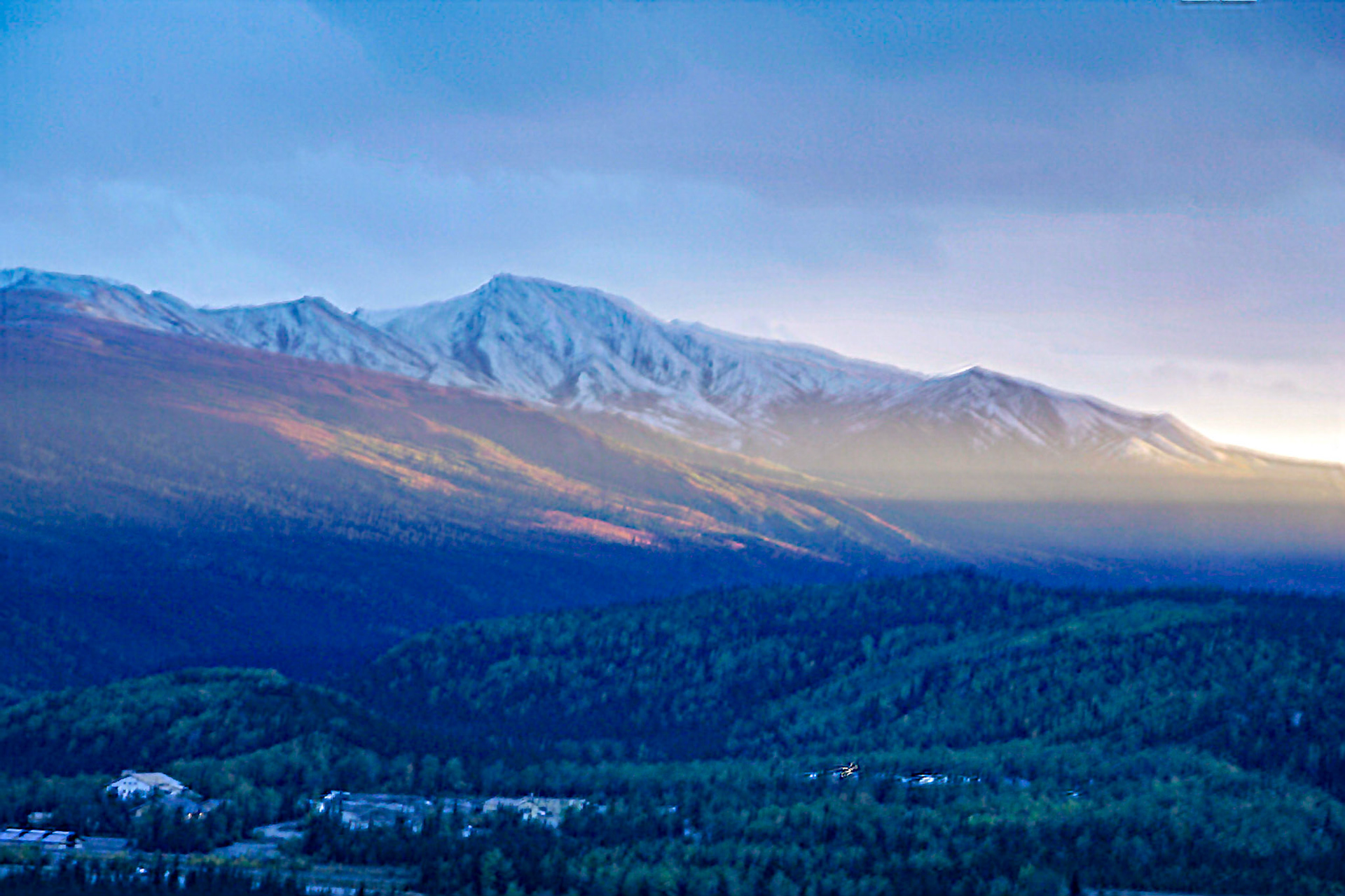 Sun setting on mountainside - Denali National Park, Alaska
