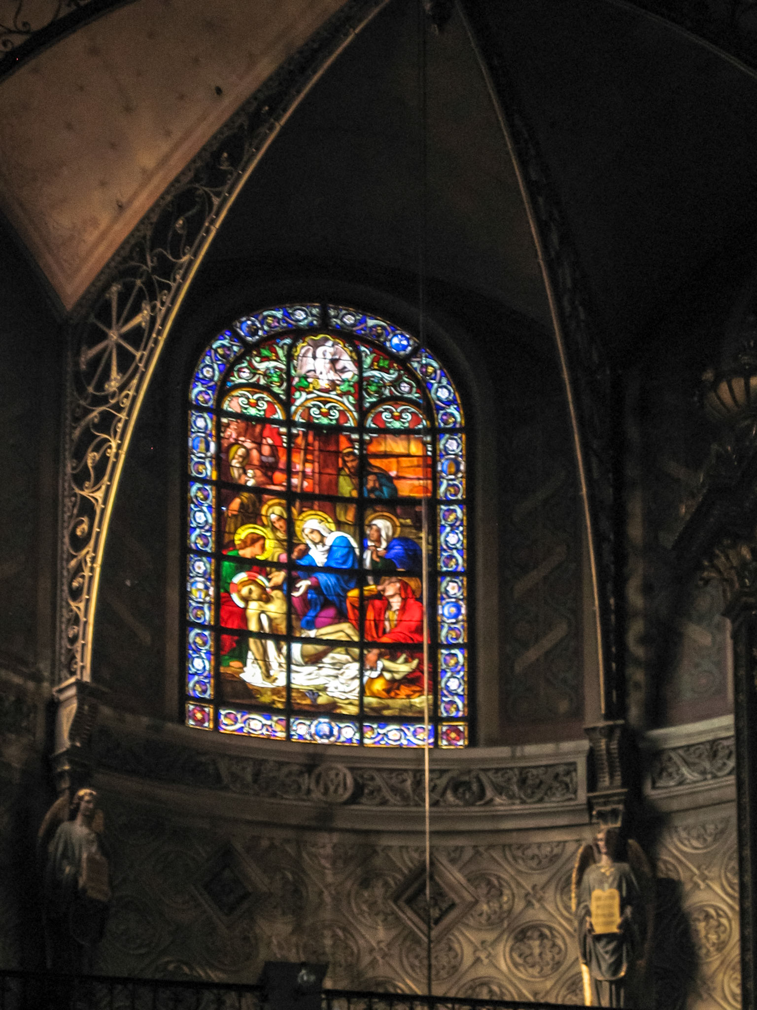 Lamentation of Christ, stained glass window in the Saint Augustine church - Paris, France