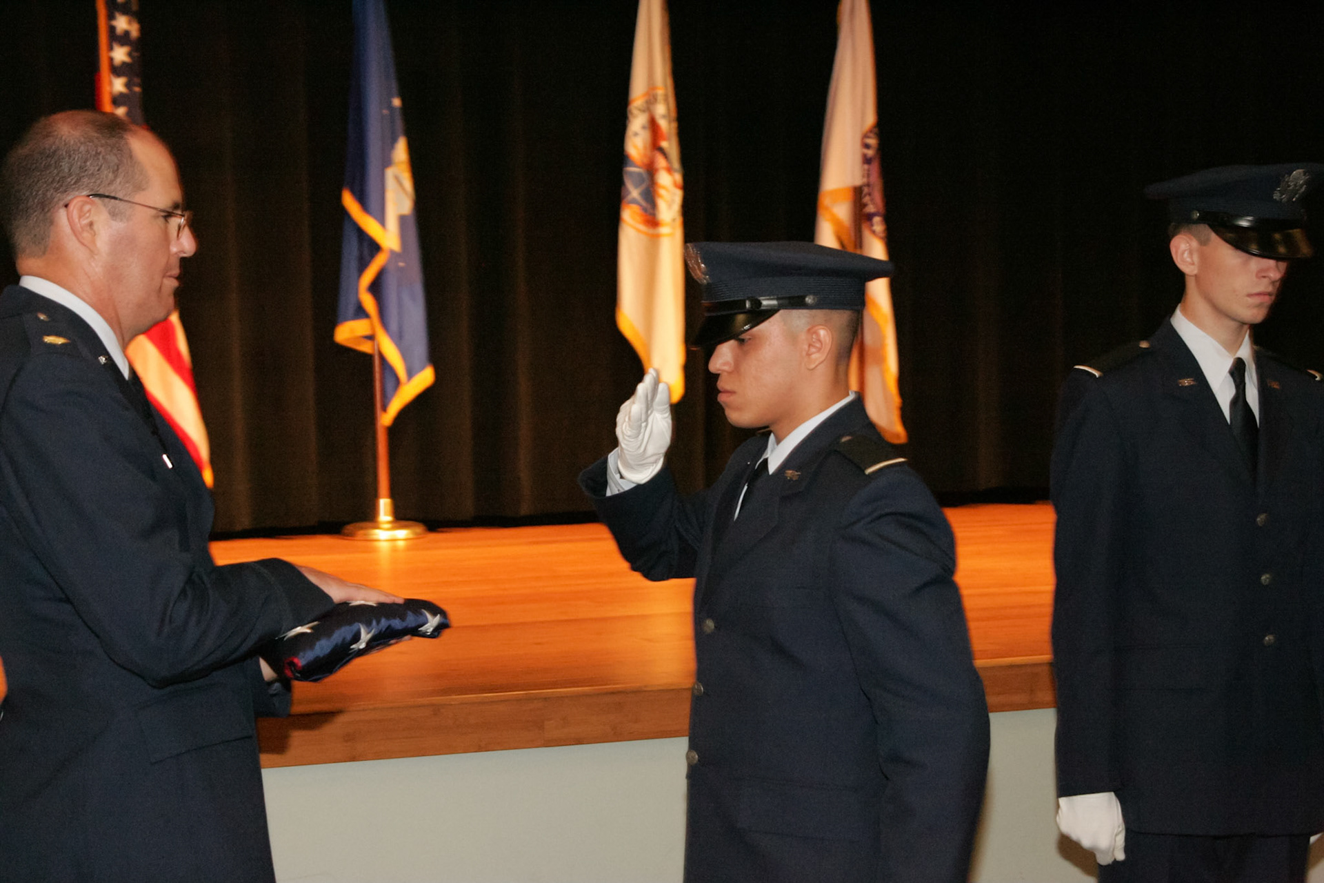 Folding and presentation of retirement flag - UF ROTC Det 150 cadets from Billy Mitchell Drill Team, Pentogon, Washington, DC
