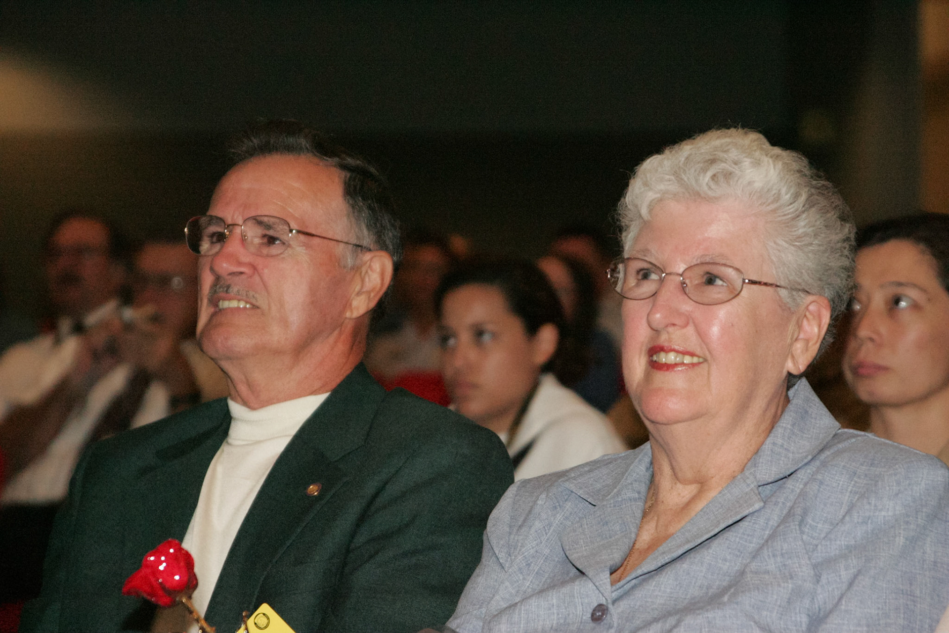 Family watching slideshow presentation at retirement ceremony - Pentagon, Washington, DC