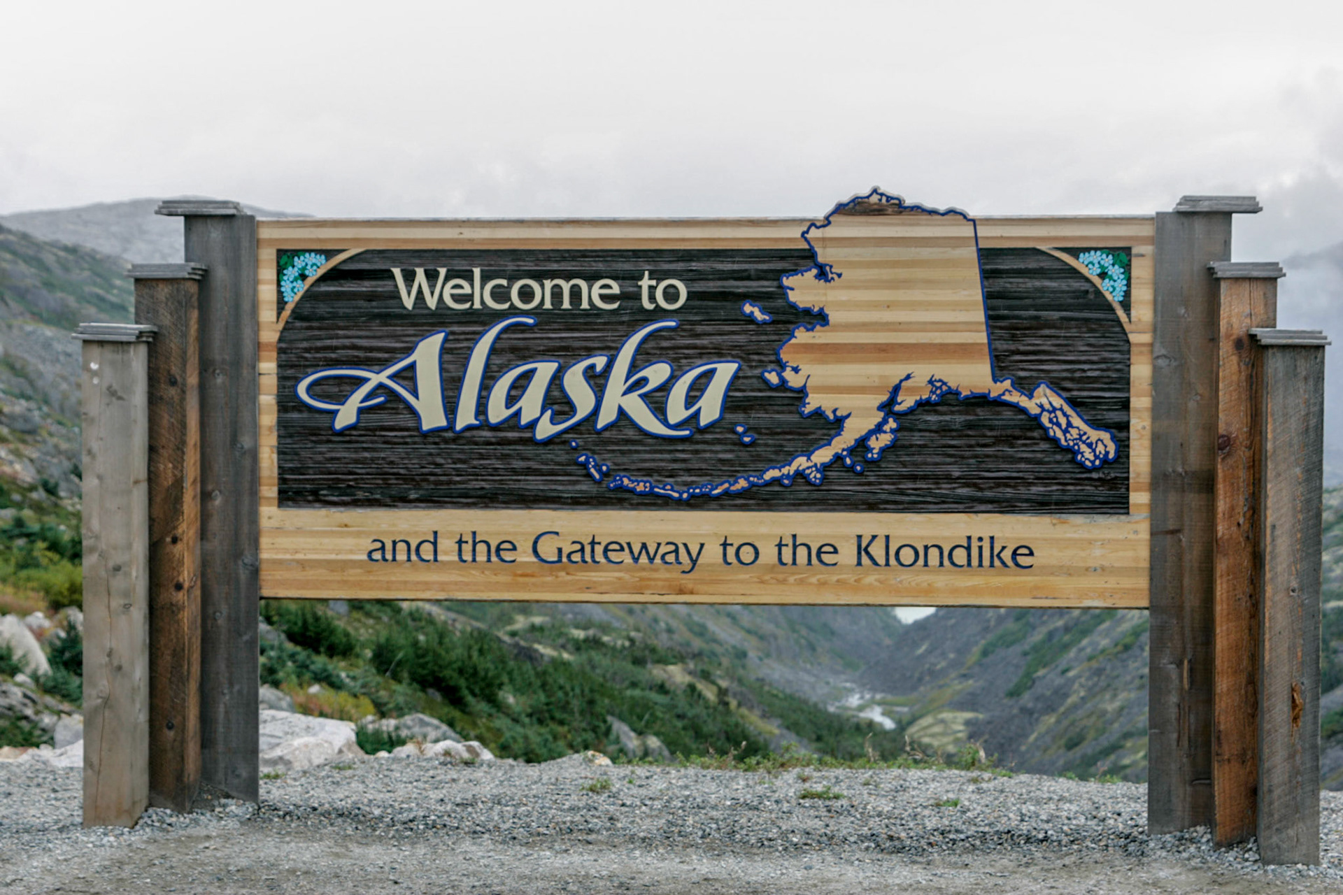 Welcome back sign after driving into the Klondike - gold rush history - Skagway, Alaska