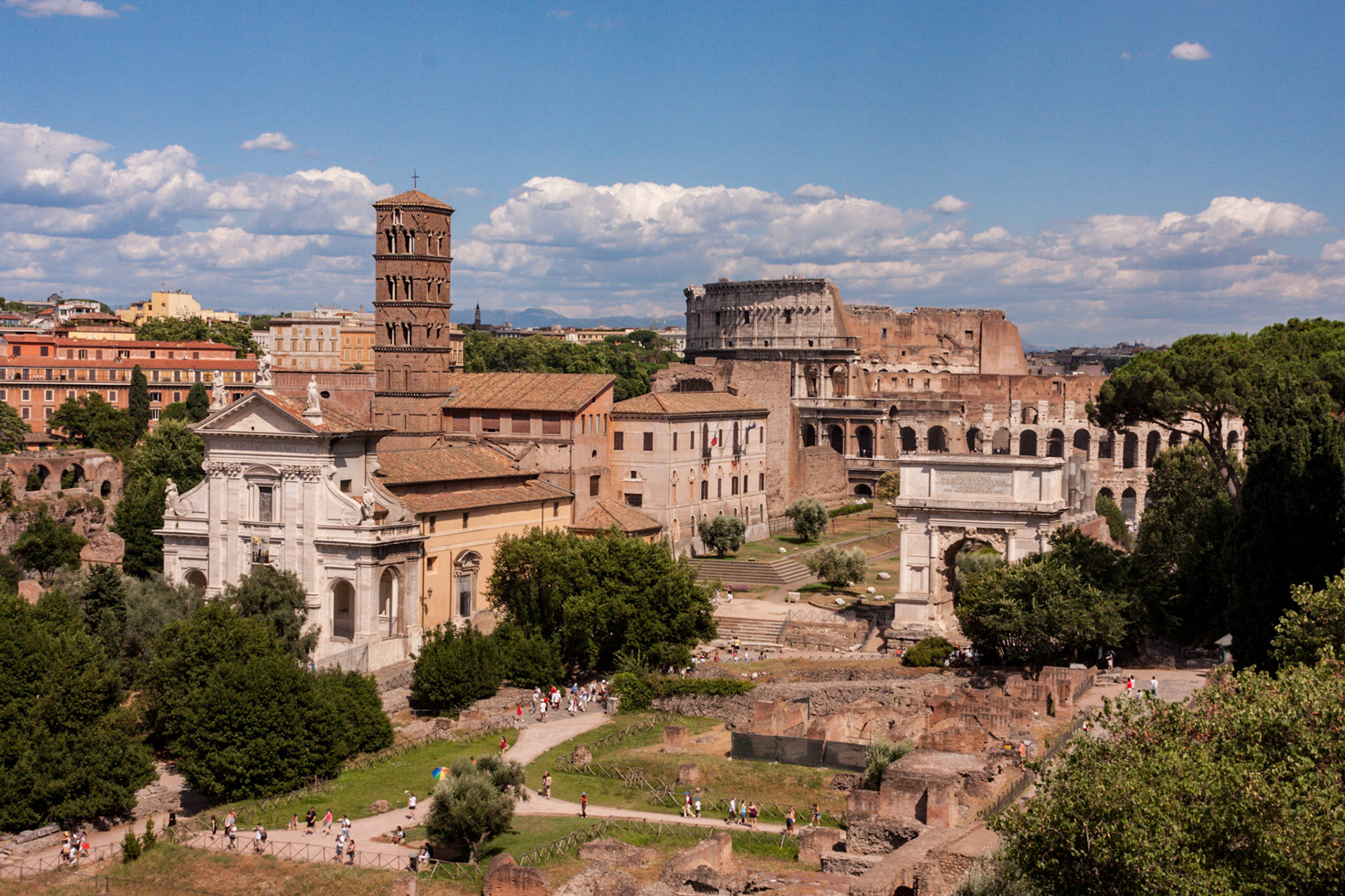 View of Roman Forum with Colosseum in background - Rome, Italy