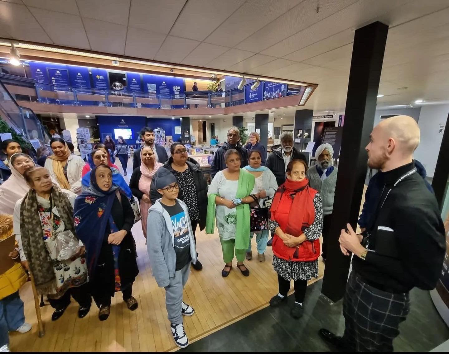 Aloys leading a tour of the exhibition. Photo credit: Rav Singh - A Little History of The Sikhs