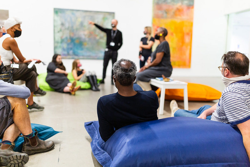 Aloys assisting with How Do You Feel? event. Image credit: Alice Hendy Photography for Arnolfini. All rights reserved.