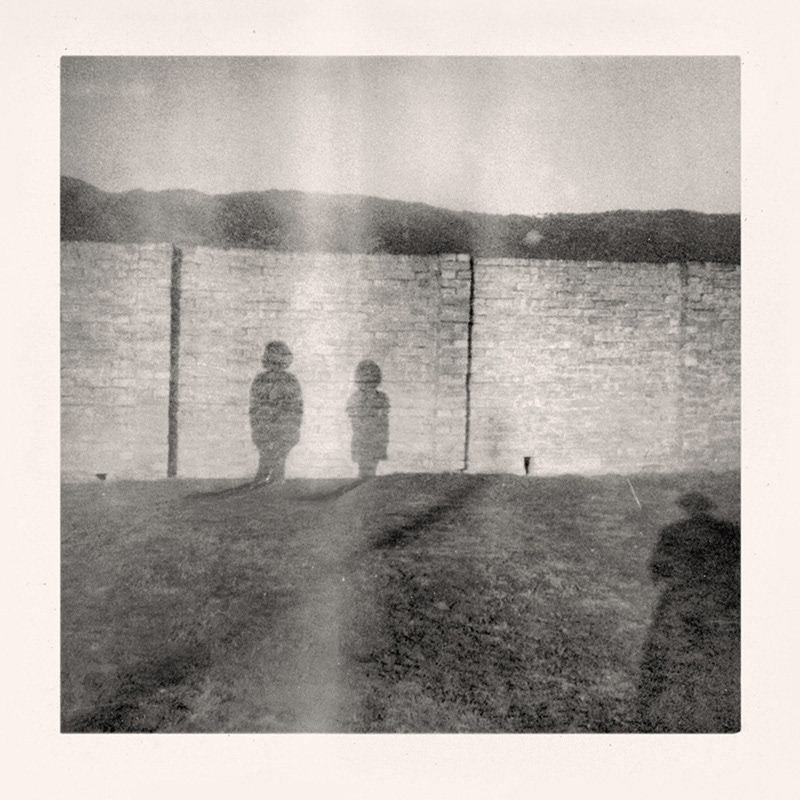 Traces: Girls Posing by Wall. Greg Sand.