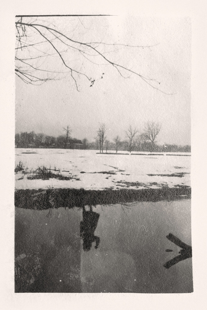 Traces: Girl Waving by Water. Greg Sand.