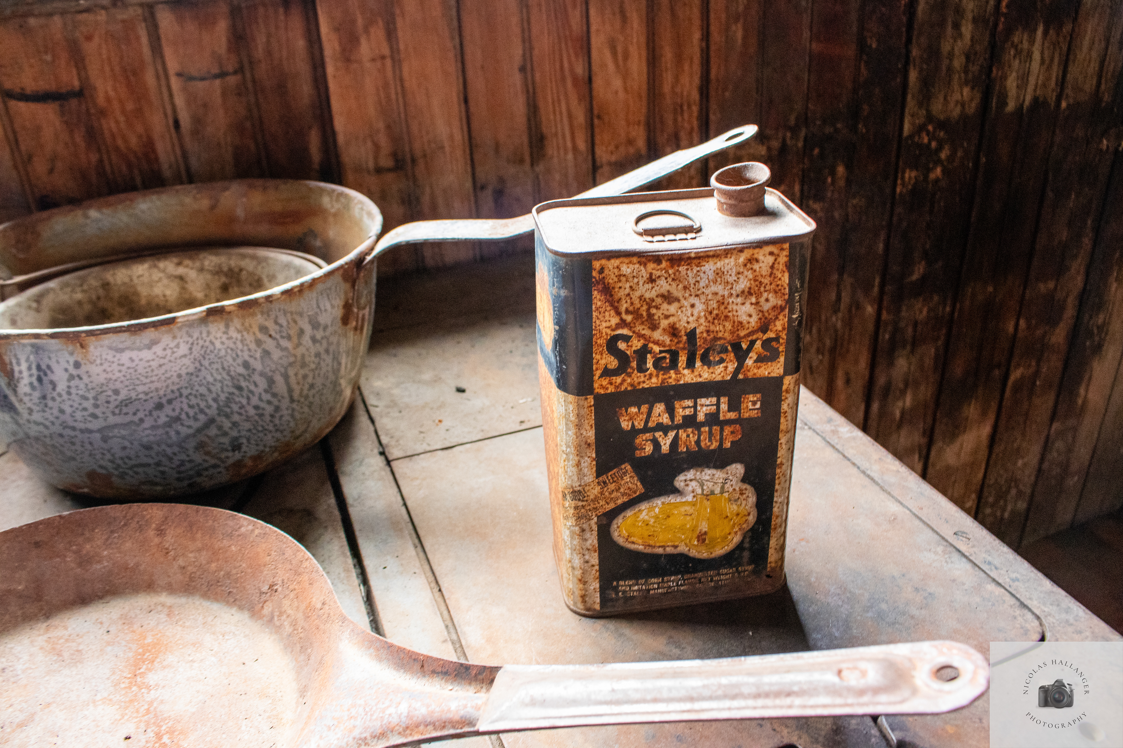 Old pots and pans and a can of waffle syrup found inside a ghost town in MT
