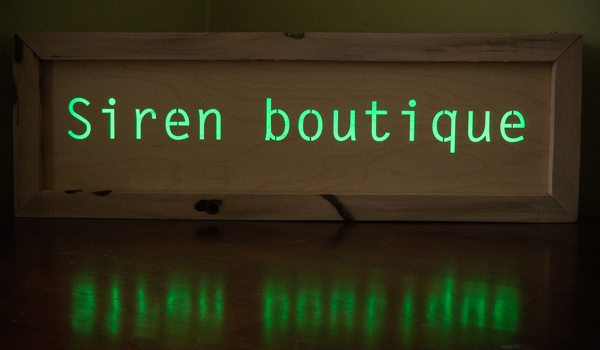 Siren Boutique Sign