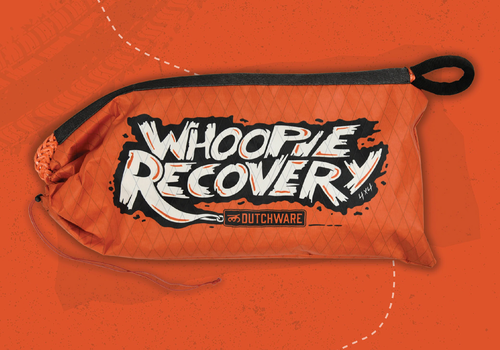 bright orange branded bag of rope for off-road recovery, grungy and rough looking