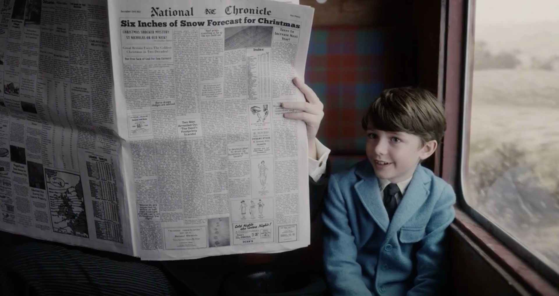 Broadsheet newspaper on screen
