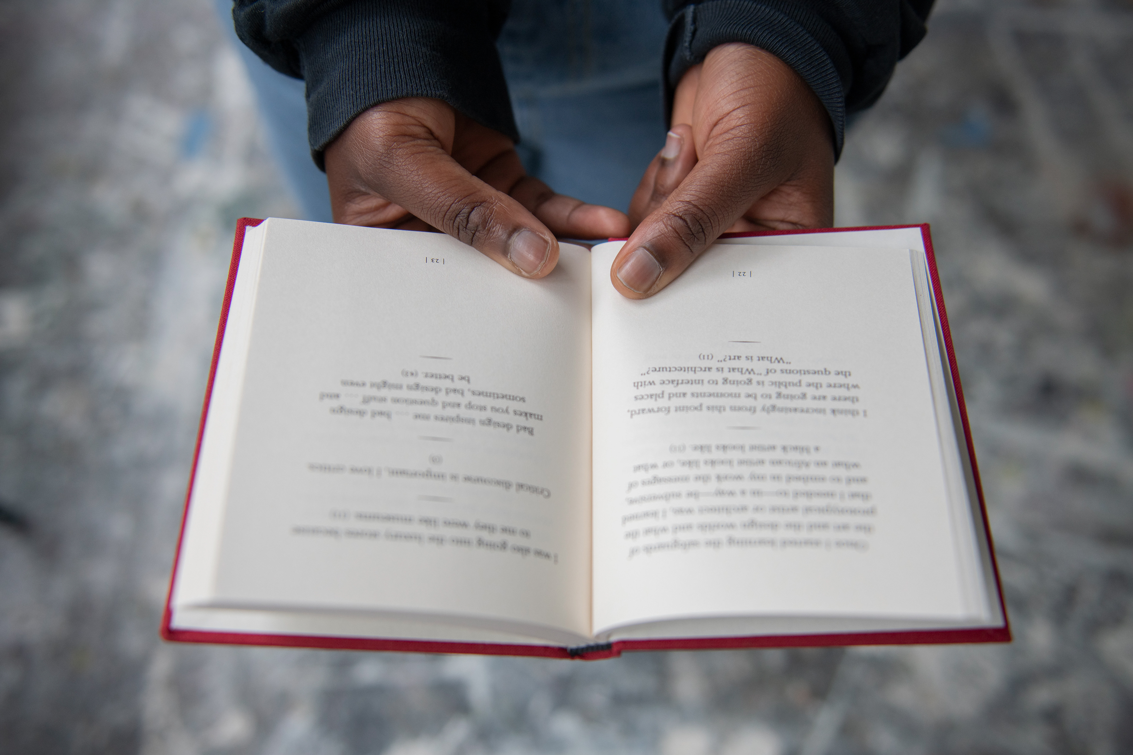 Kapurura holds a copy of Virgil Abloh’s book of quotes. Abloh is an American fashion designer and one of Kapurura’s biggest inspirations. Kapurura says Abloh, who passed in late 2020, combined a skating and street world style with that of high end brands like Louis Vuitton. To Kapurura, Abloh walked a path she hopes to follow.