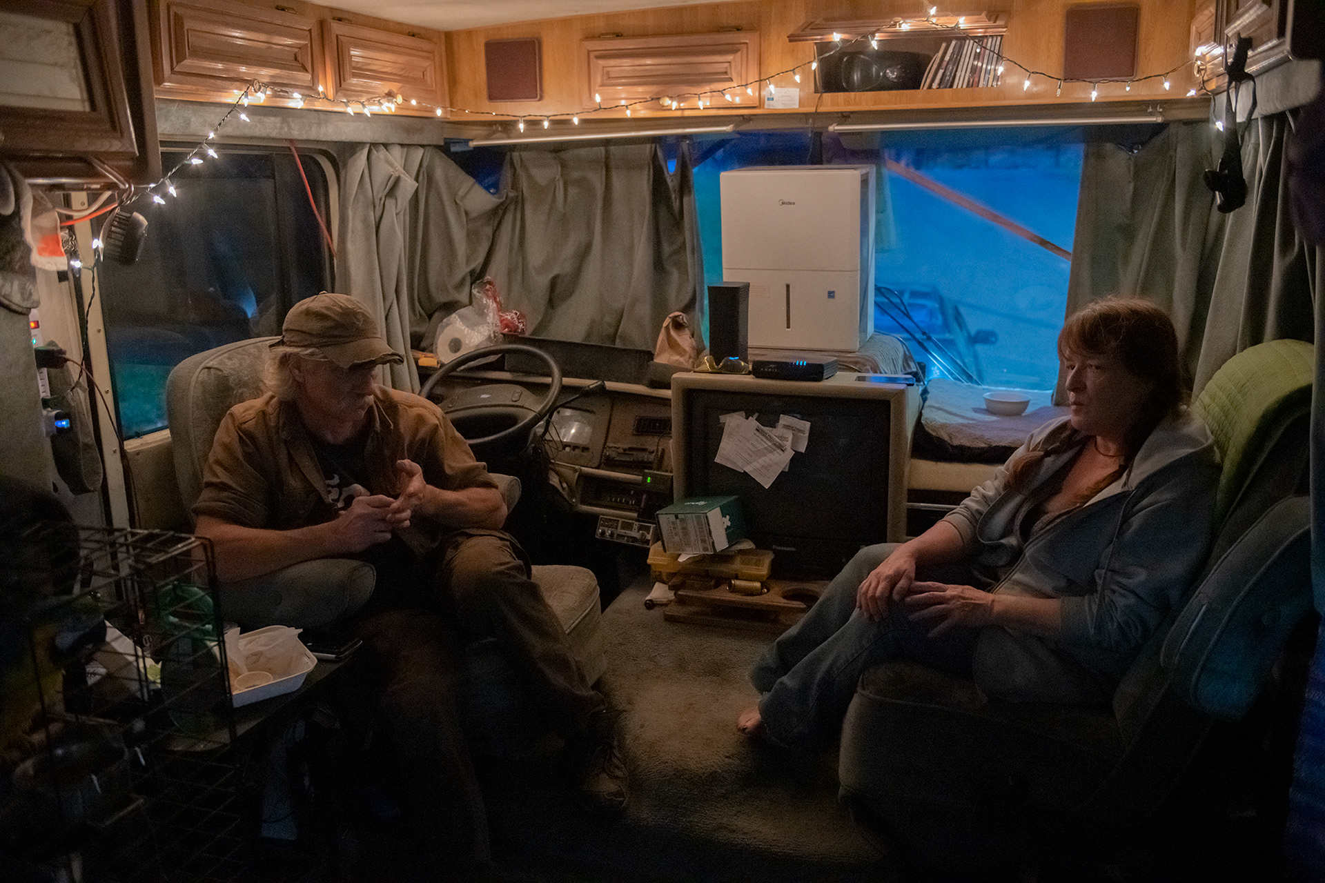 Andrew and Sarita Carrino have been living in limbo for more than a year and a half since the Holiday Farm fire. Burned out of their home, living in a van and recreational vehicle in the interim, their quarters have been tight. They share space with their two dogs, Nessie and Dakota, and parrot, Parker.