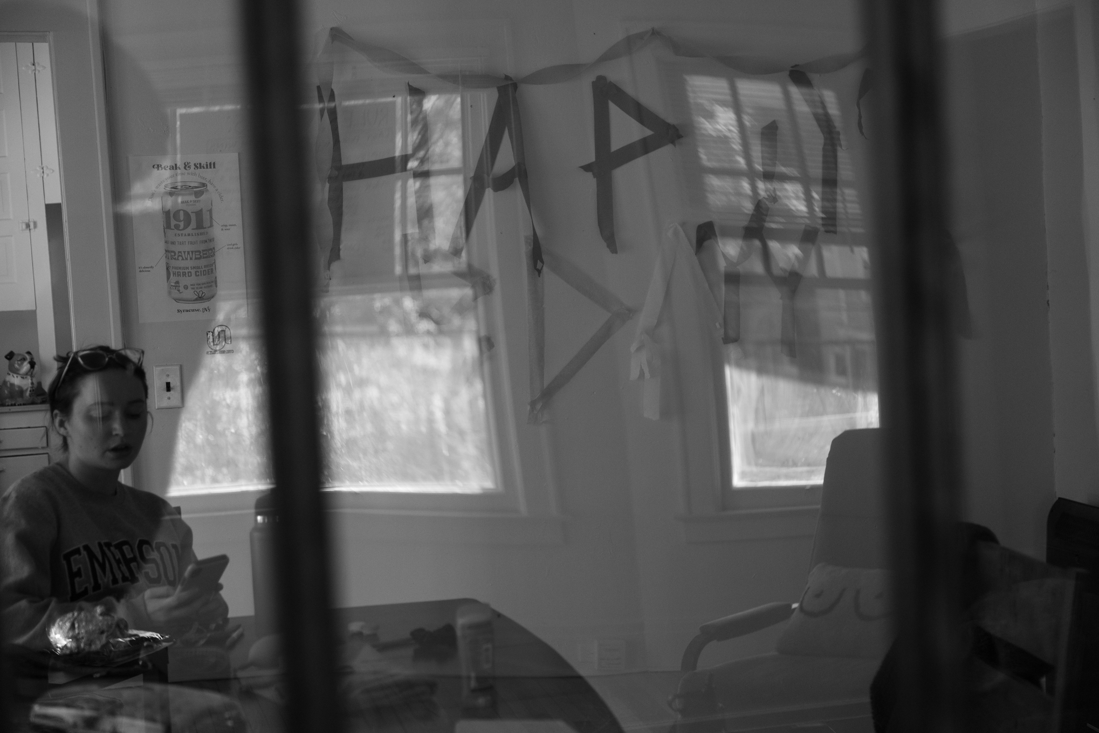 Margo Moran, a student at Syracuse University, cleans her home on a quiet Saturday afternoon.