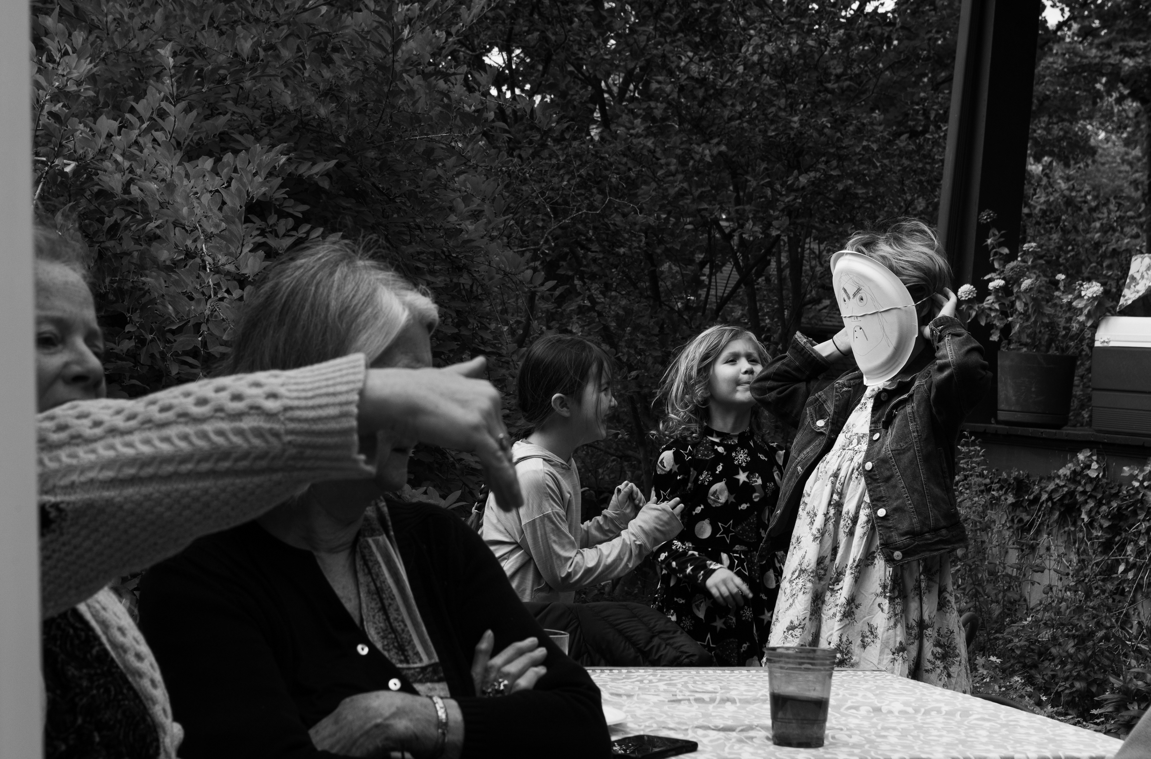 Neighbors and family members gather at Miranda and Kenneth Hine's potluck. The Hine’s family began this tradition with the intention of introducing themselves to their new neighbors at the start of each school year. The event was an annual staple for the neighborhood before it was interrupted for two years by the COVID-19 pandemic. This year, as the residents of the block gather again, marks the continuation of the decades-long tradition.