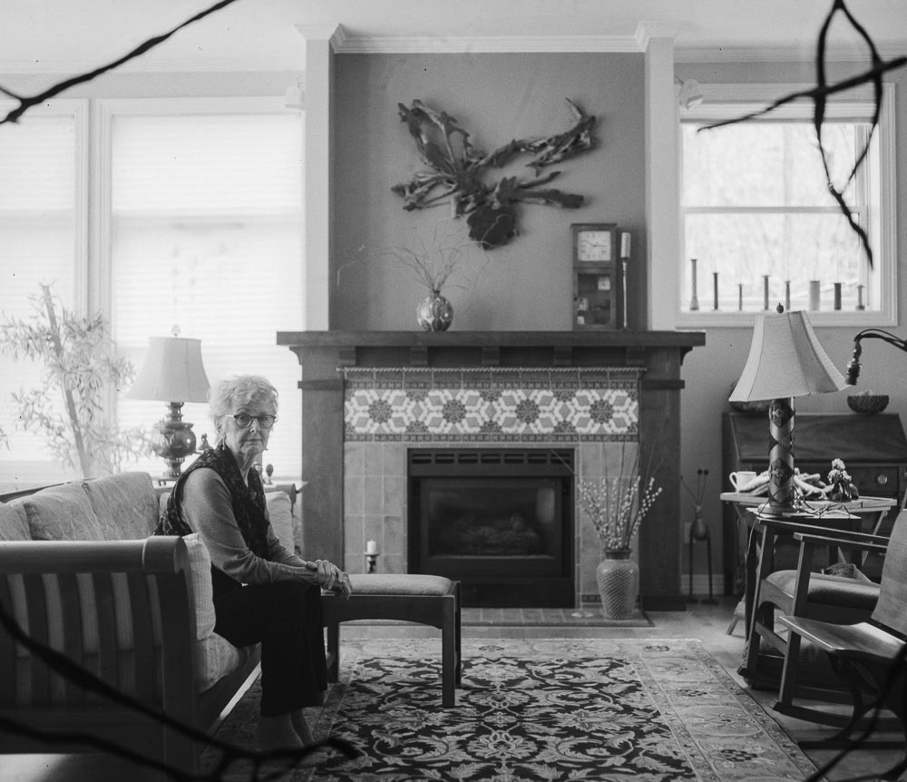 Nancy Hiser poses for a portrait in her home. Hiser lives less than a mile away from the CEI hub in a small community called Linnton. Lintonn residents, living just next to the CEI hub surrounded by forest land, are at the most direct risk if a catastrophe occurs at the hub. Hiser has spent the last decade advocating for federal, state and city officials to ensure these tanks don't topple, spill and catch fire during a major earthquake.