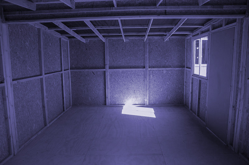 Left interior view of the 19 m² emergency shelter built with OSB panels.