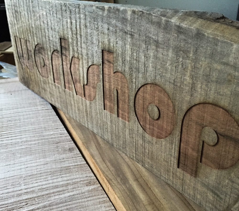 laser engraved sign on barn board