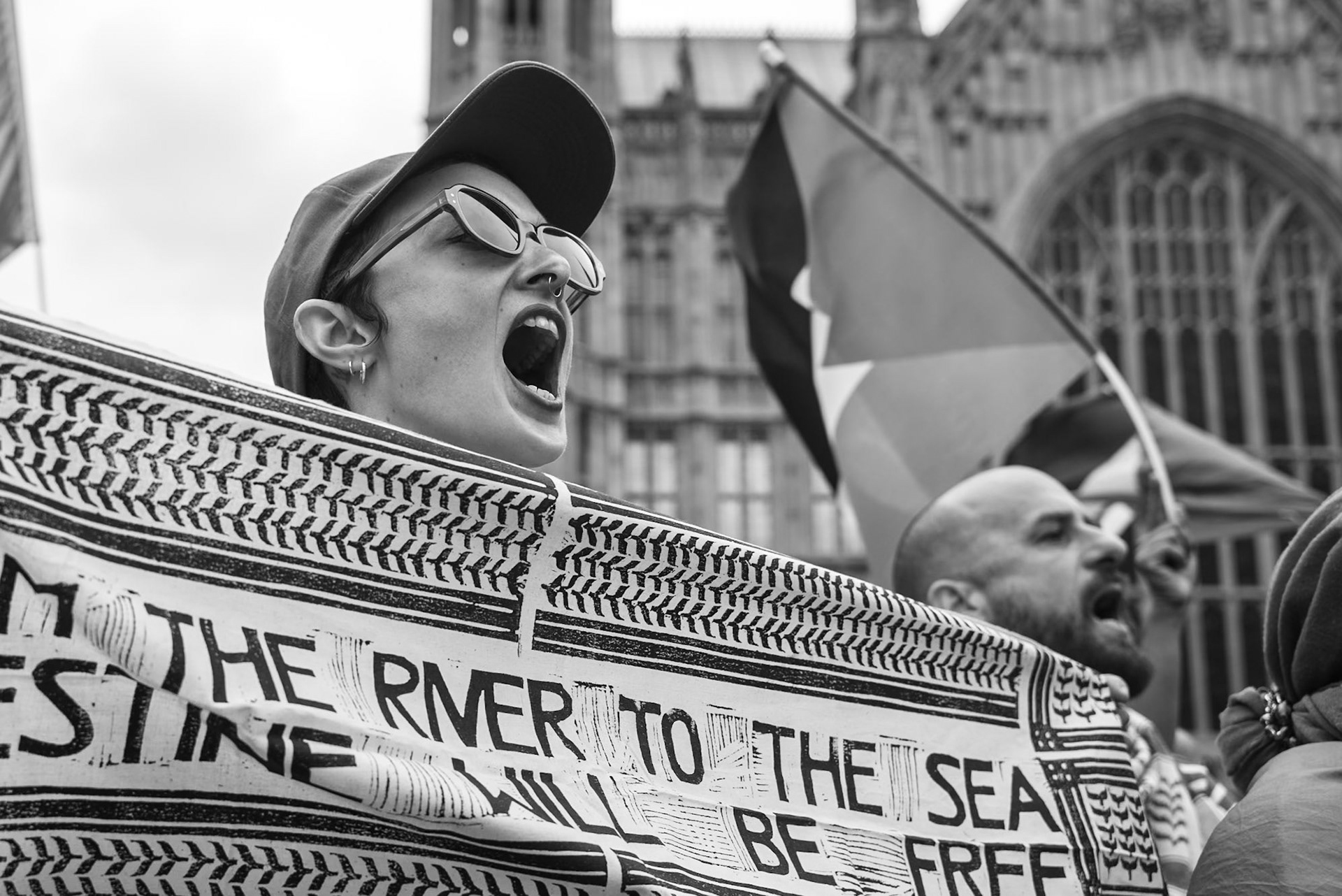 London, UK. 06 JUN 2025. Protesters wearing red surrounded Parliament, demanding that the UK government stop arming Israel.Aubrey Fagon / Alamy Live News
