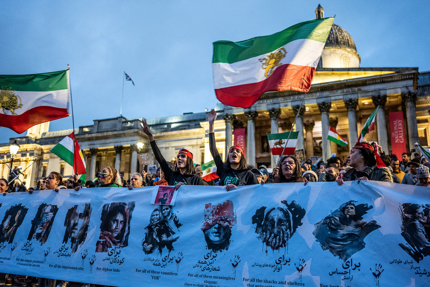 British-Iranian activist protesting against the Islamic Republic regime in Iran. Gathered outside Downing Street, demanding the closure of the Iranian Embassy in London.