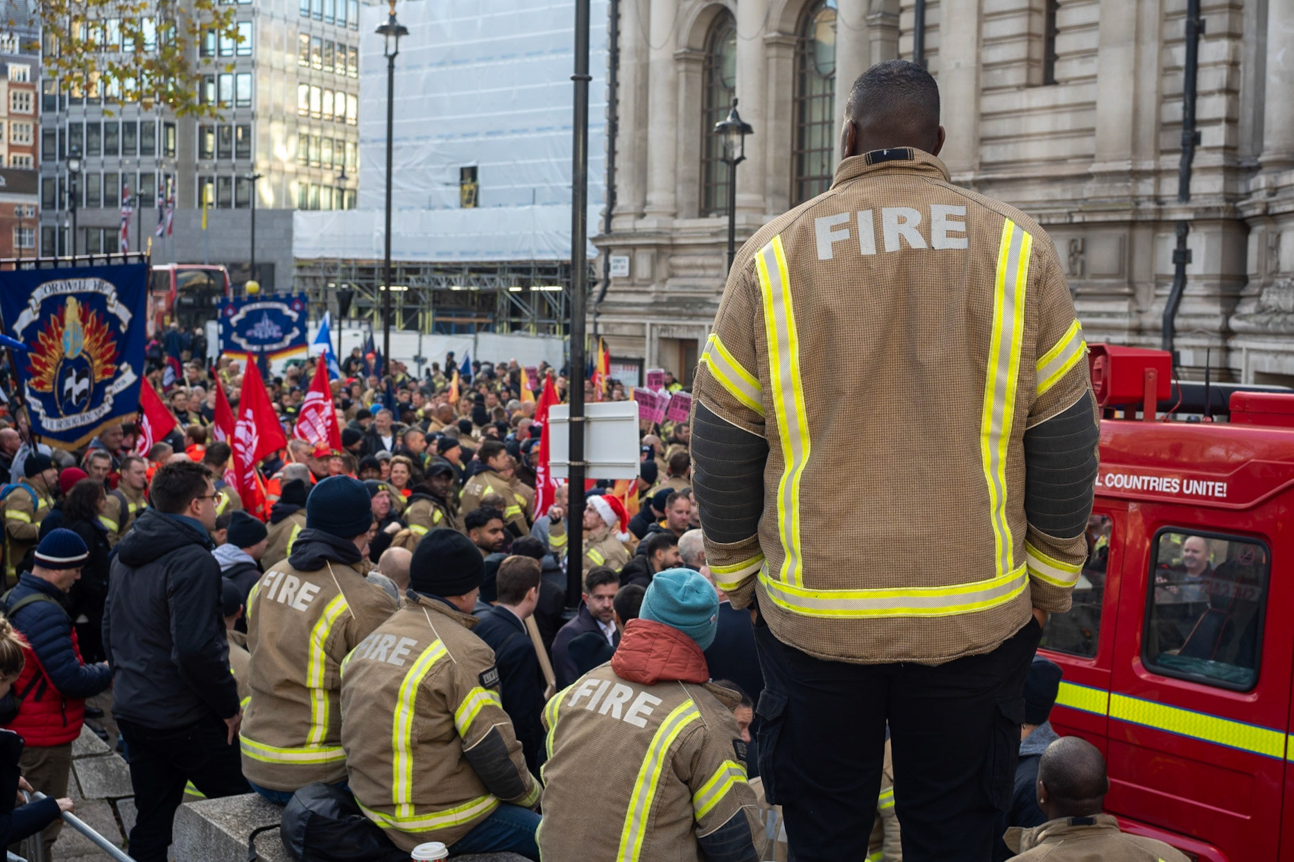 London/UK 06 Dec 2022.  FBU (Fire brigade Union) opened their strike ballot to their 32,000 members of firefighters and control staff. With a show of solidarity hundreds of firefighters then marched from their meeting to Houses of Parliament, demanding a fair pay rise. Aubrey Fagon/Live Alamy News