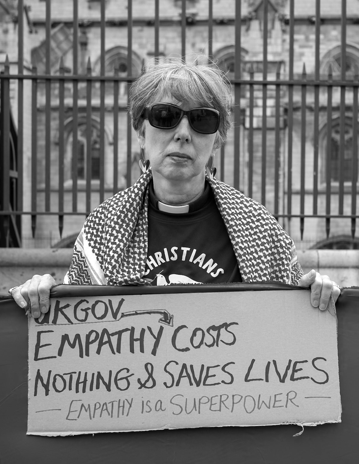 London, UK. 06 JUN 2025. Protesters wearing red surrounded Parliament, demanding that the UK government stop arming Israel.Aubrey Fagon / Alamy Live News