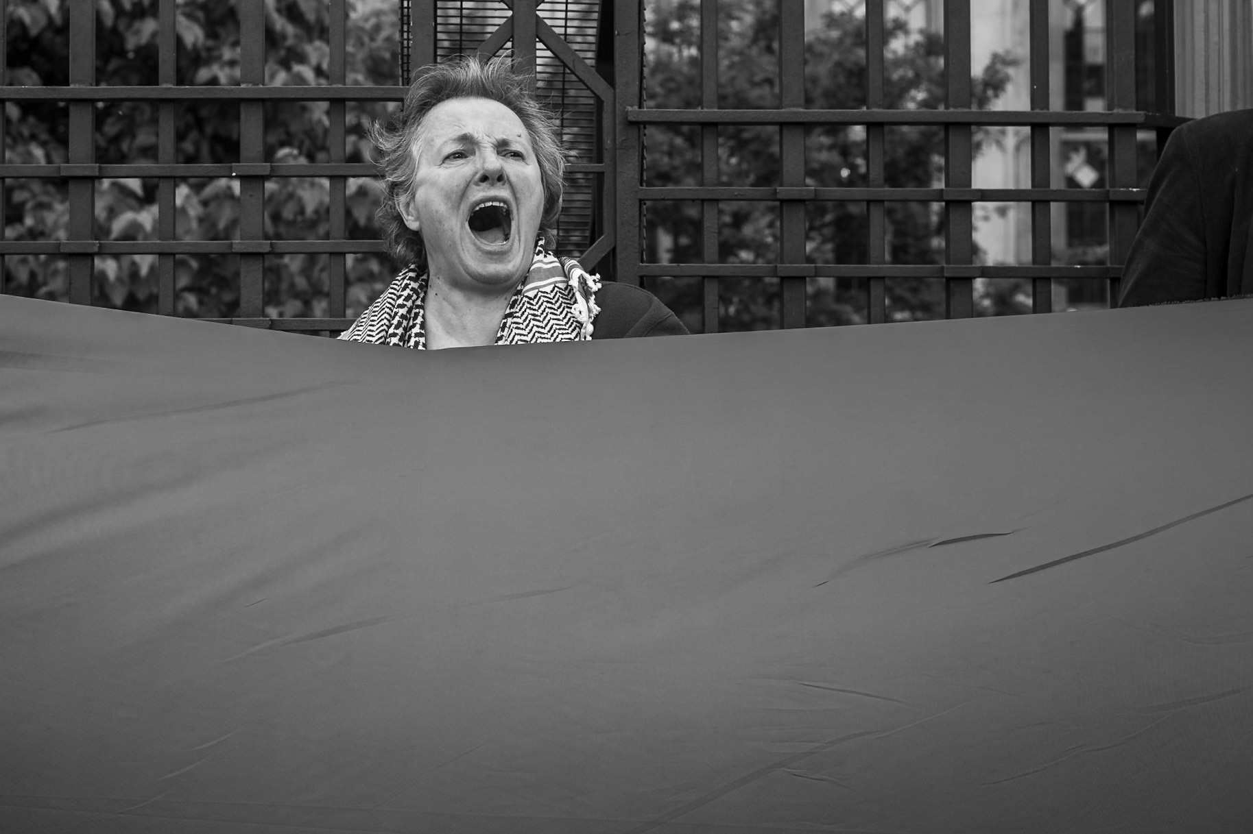 London, UK. 06 JUN 2025. Protesters wearing red surrounded Parliament, demanding that the UK government stop arming Israel.Aubrey Fagon / Alamy Live News