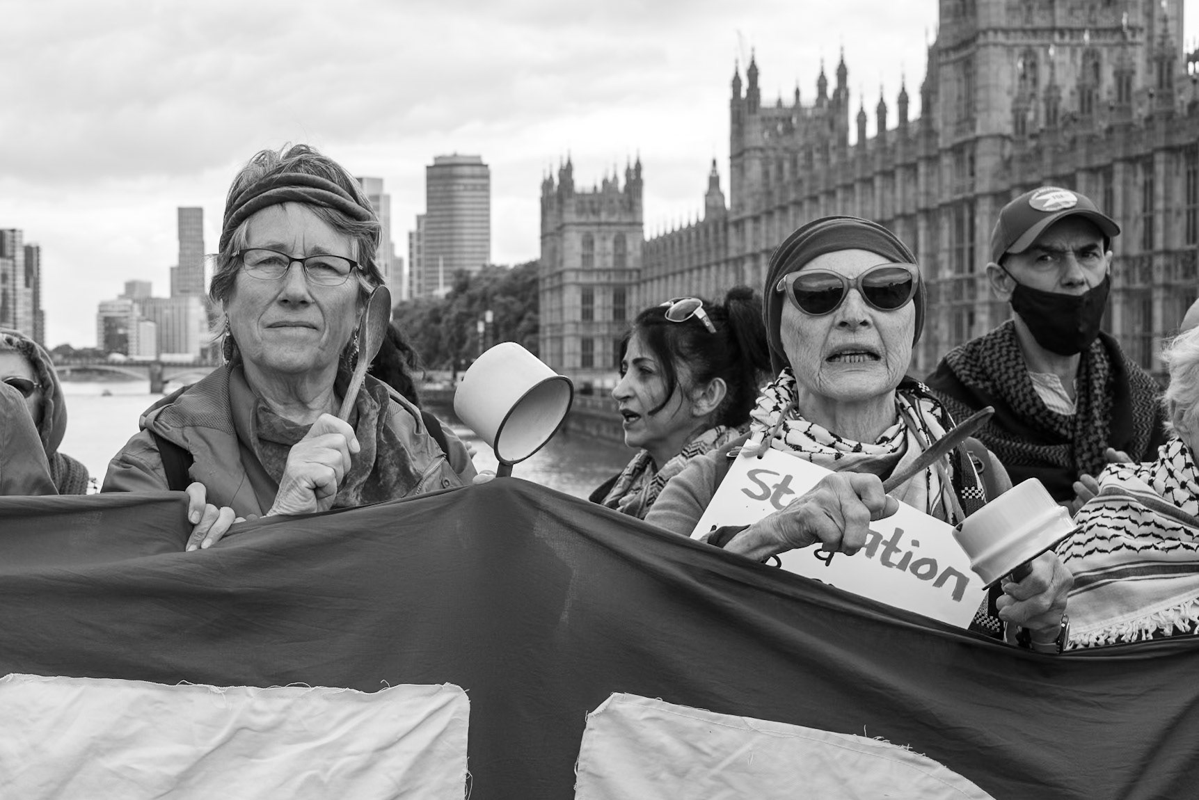 London, UK. 06 JUN 2025. Protesters wearing red surrounded Parliament, demanding that the UK government stop arming Israel.Aubrey Fagon / Alamy Live News
