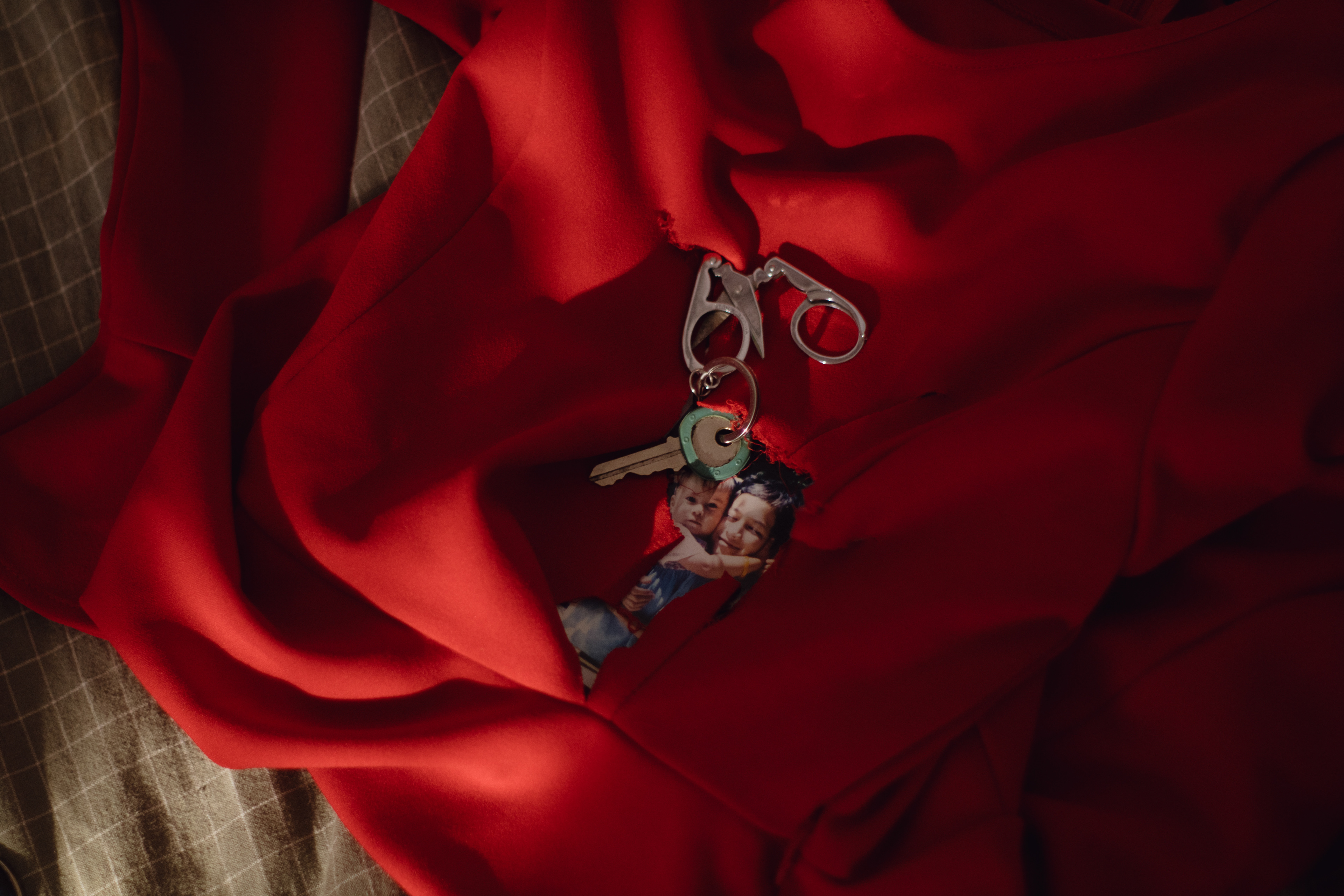 Alejandro and me as kids. The key to the house we used to live in and mom's old keychain.