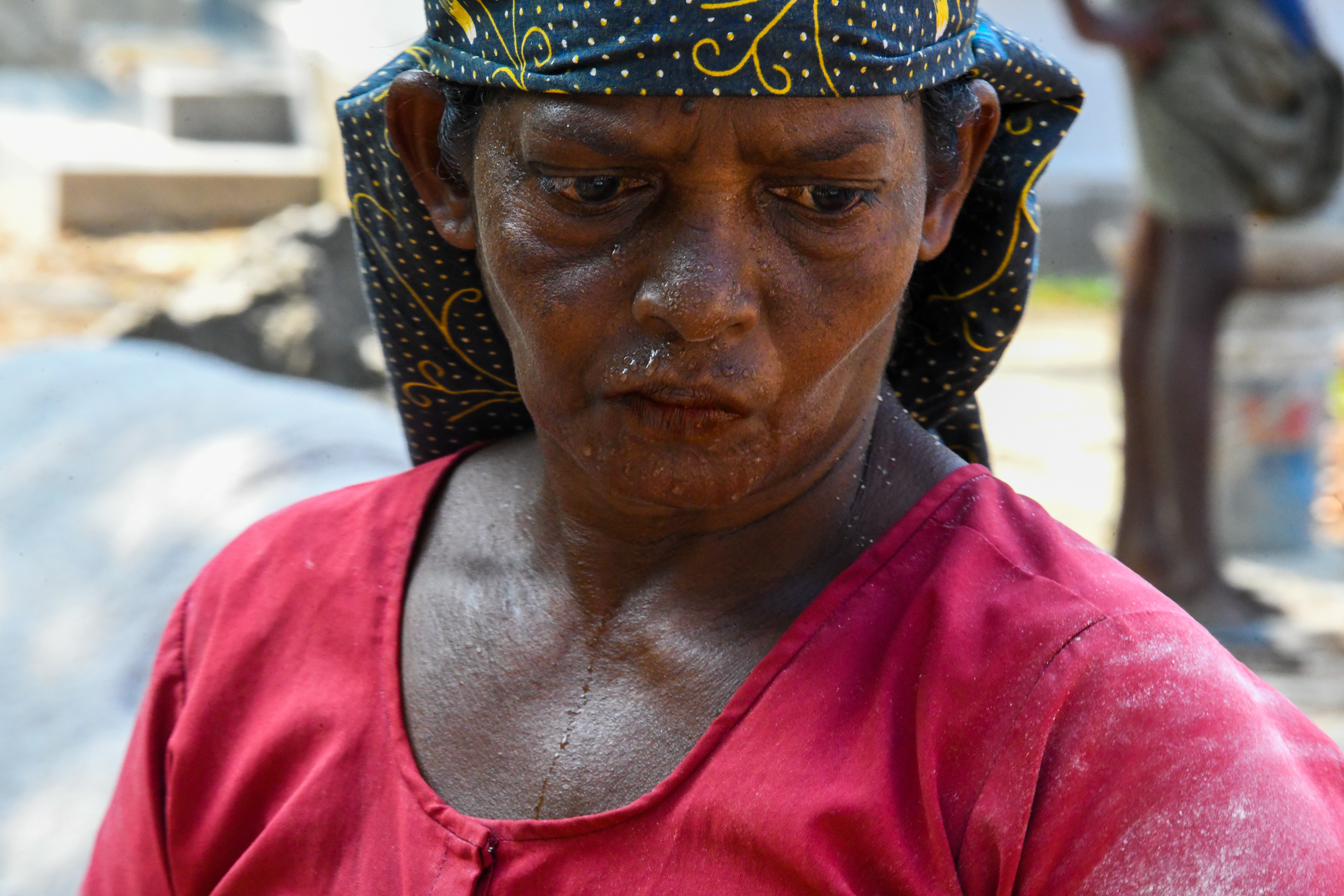 This woman is a "head-loader" in Kerala, India. Story to be told later.