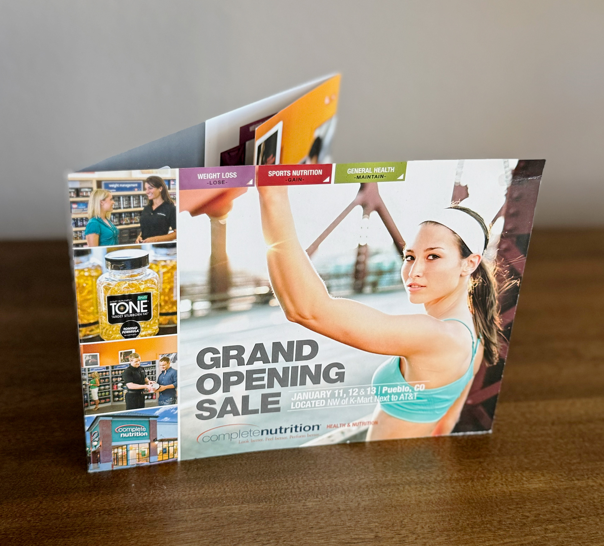 Direct mailer design for a franchise store grand opening.