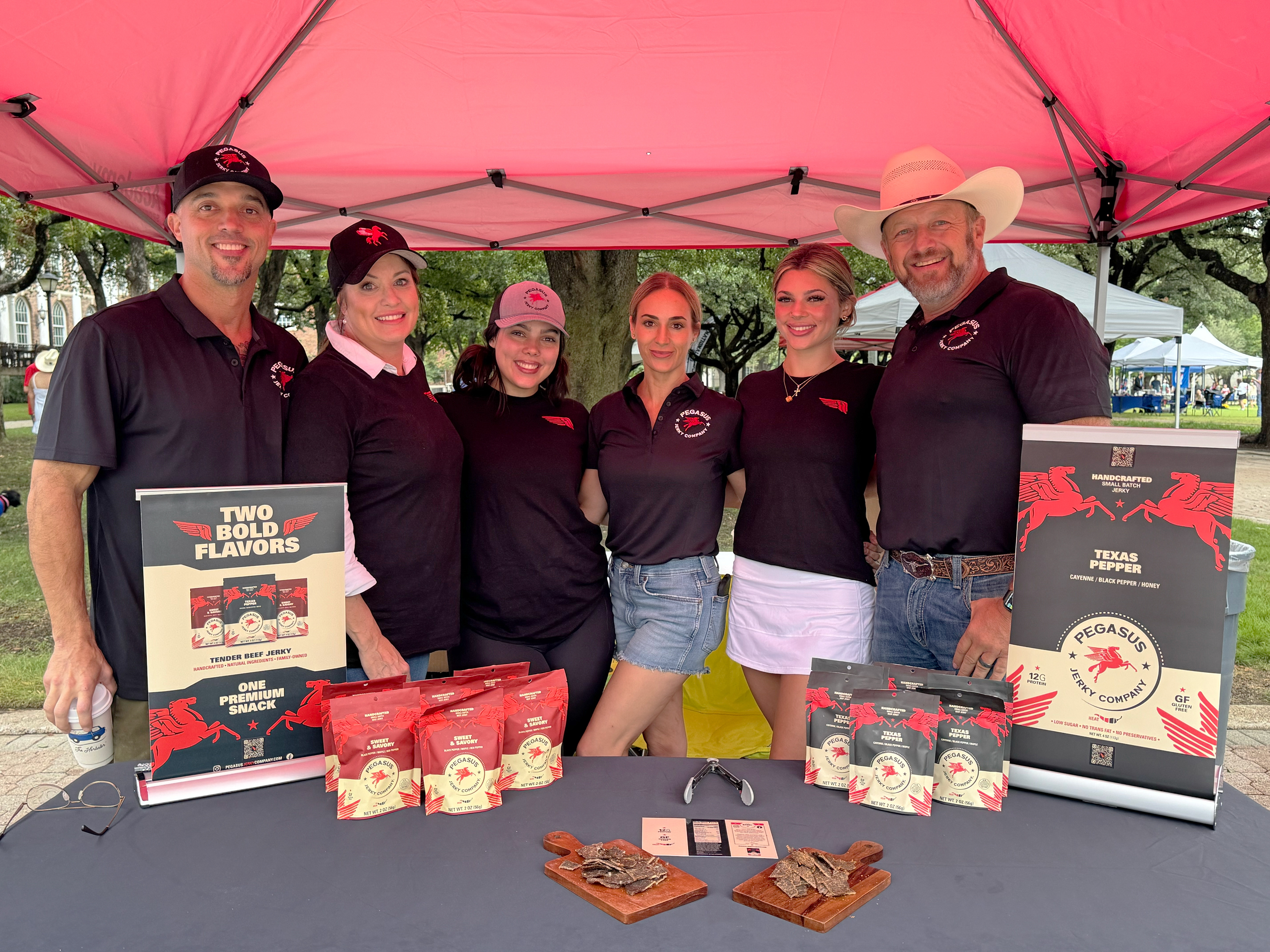The family-owned Pegasus Jerky Company team sampling at an SMU Football event.