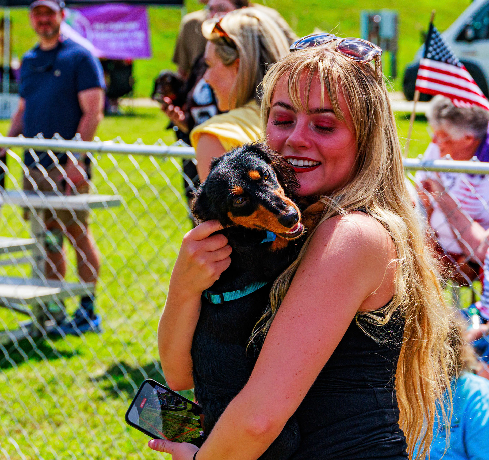 Weenie dog races 2024, one of the winners with it's person.
