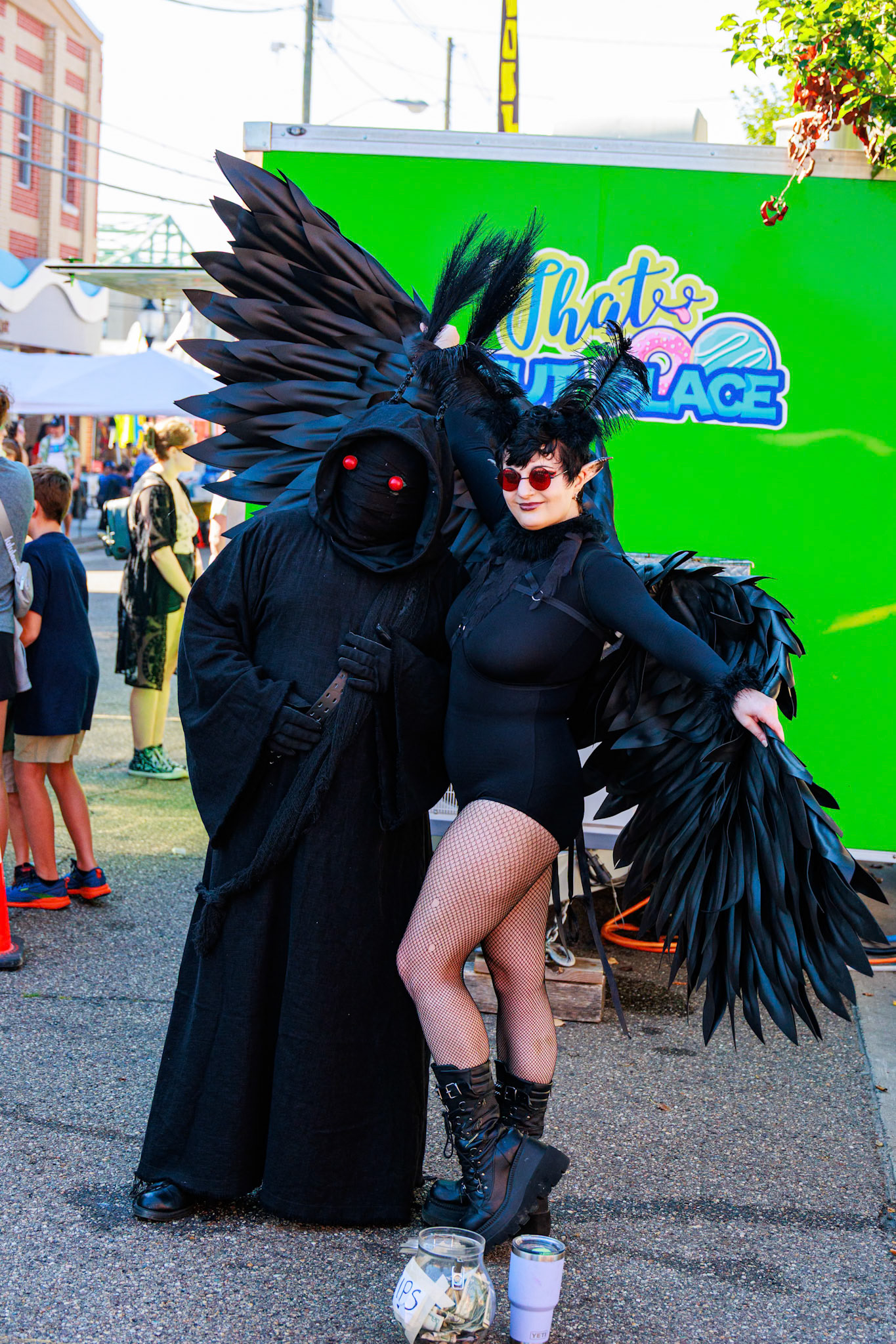 Two Mothman cosplayers at the Mothman Festival in Point Pleasant, WV